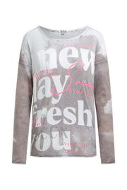 Pullover mit All Over Print und Schmucksteinen